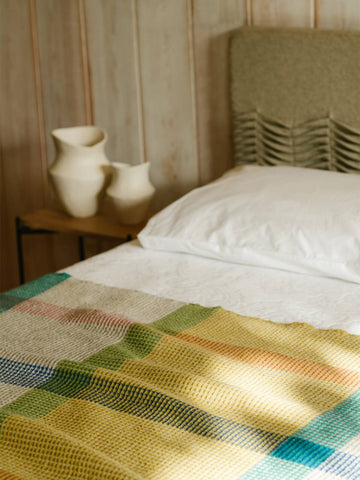 wool-blanket-waffle-texture-mustard-bedroom